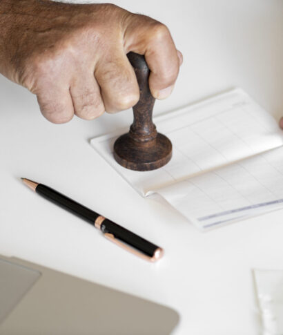 People checking bankbook isolated on white table